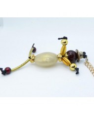  Sautoir poupée perle écru et doré