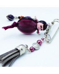 Broche poupee violet