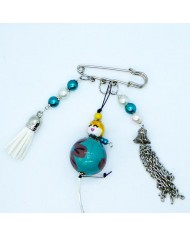  Broche poupee turquoize