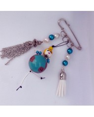  Broche poupee turquoize