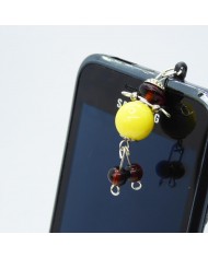 Bijou de portable poupee jaune et marron