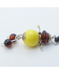 Bijou de portable poupee jaune et marron