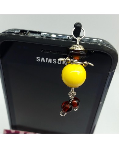 Bijou de portable poupee jaune et marron