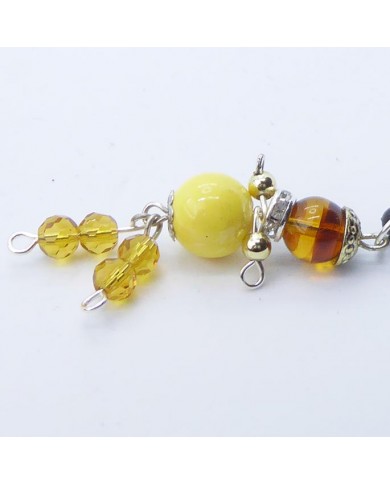 Bijou de portable poupee marron et jaune Bijou de portable poupee marron et jaune