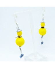 Boucle d'oreilles poupee perle jaune